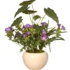 National Tree Company Potted Flower Plants^ Artificial Potted Plant, Decorated With Purple Flower Blooms, Flowing Stems, Includes Cream Ceramic Pot Base, Spring Collection, 18 Inches