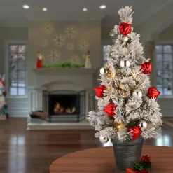 Slim-National Tree Company Pre-Lit Artificial Christmas Tree, Green, Snowy Bristle Pine, White Led Lights, Decorated With Pine Cones, Ball Ornaments, Includes Pot Base, Battery Operated, 24 Inches