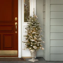 Clear-National Tree Company Pre-Lit Artificial Entrance Christmas Tree, Snowy Sheffield Spruce, Green, White Lights, Includes Metal Base, 4 Feet