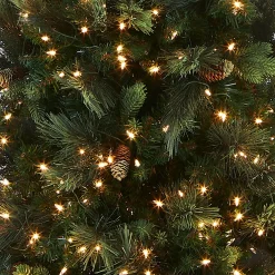 Clear-National Tree Company Pre-Lit Artificial Giant Slim Christmas Tree, Green, Carolina Pine, White Lights, Flocked With Pine Cones, Includes Stand, 12 Feet